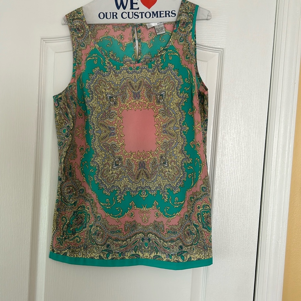 Sleeveless  pastel colored top in large